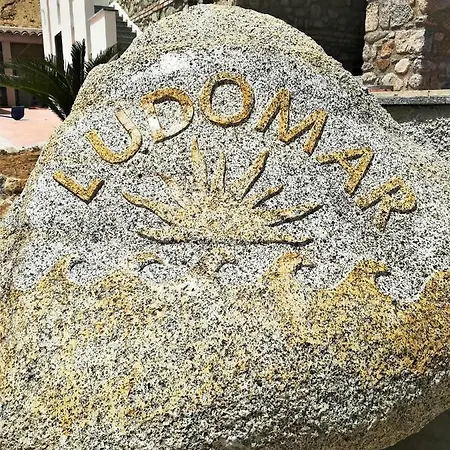 Ludomar Country - & *